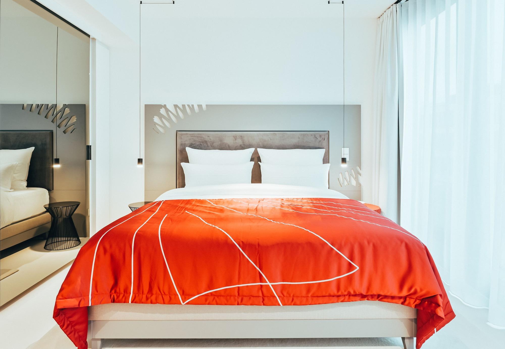 Kpm Hotel & Residences Berlín Exteriér fotografie A bed with a duvet